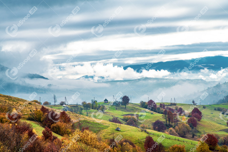 Beautiful nature of the carpathians in the hills of the sky, forests and a small village