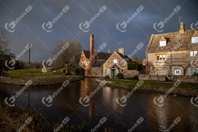 Beautiful shot of the chimney and mill in Lower Slaughter village, Cotswolds region, England