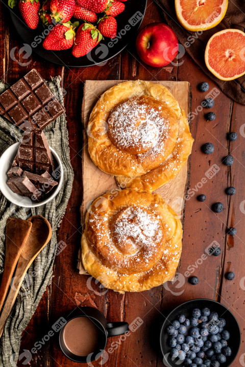 Breakfast food and drink on wooden table