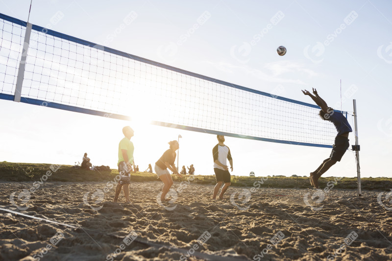 Friends playing volleyball on beach 2024 10 11 23 05 58 utc