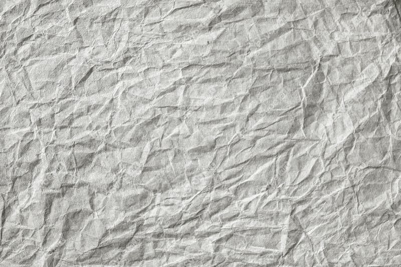 Grungy crumpled textured paper background