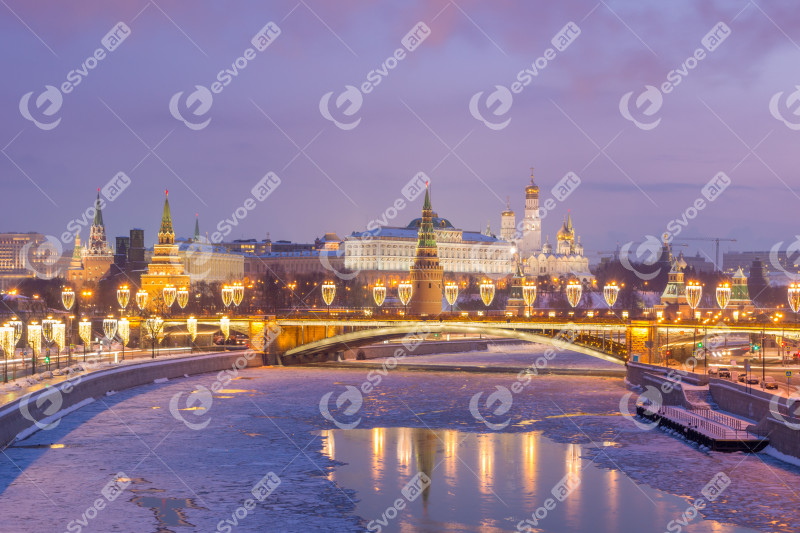 Moscow Kremlin and Frozen Moscow River at Sunrise in Winter. Pin