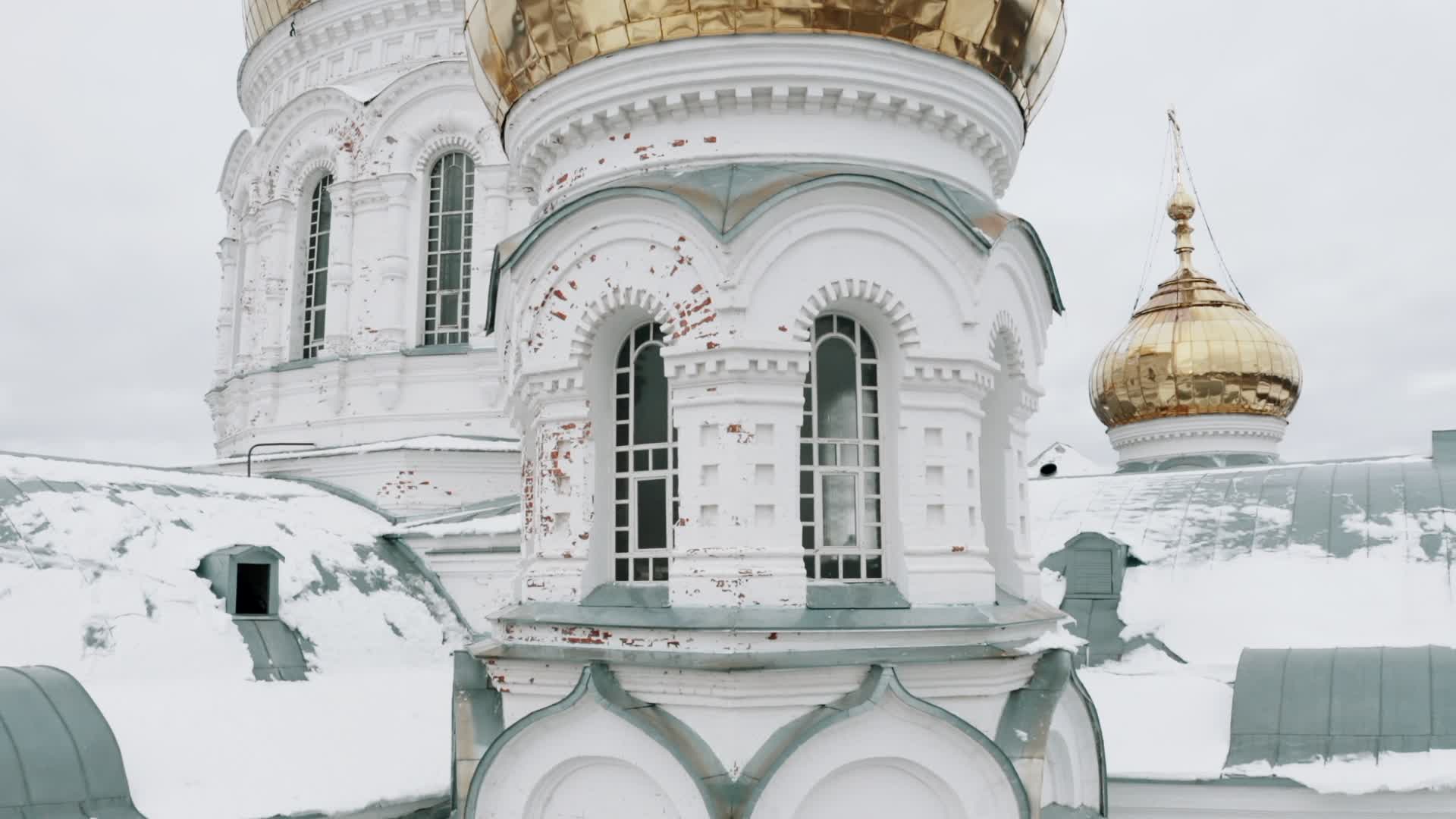 Facade of the orthodox church with golden domes