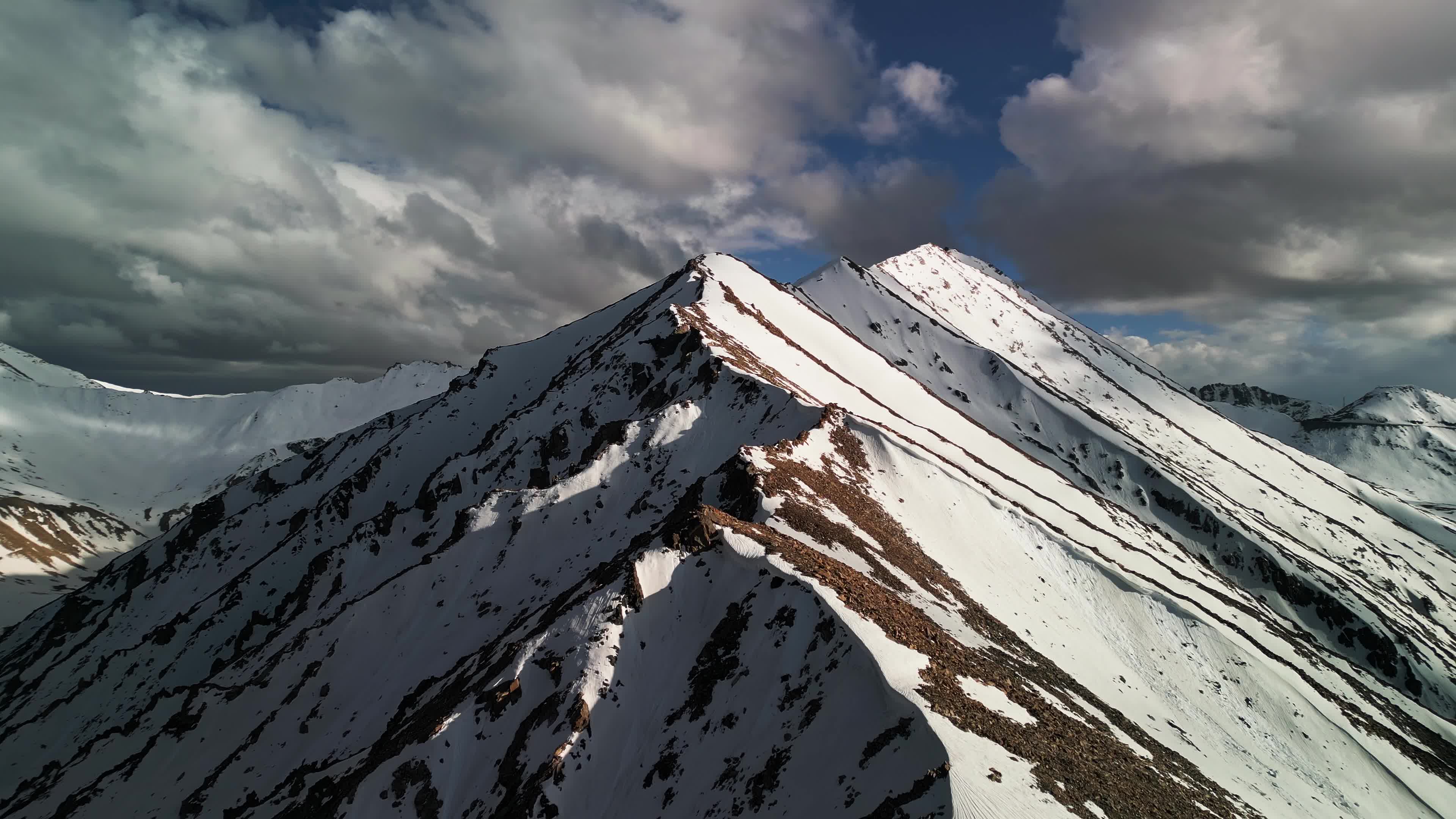 Snowy mountains of tibet in the clouds 2024 04 29 16 16 39 utc